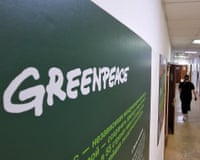 Greenpeace sign on wall