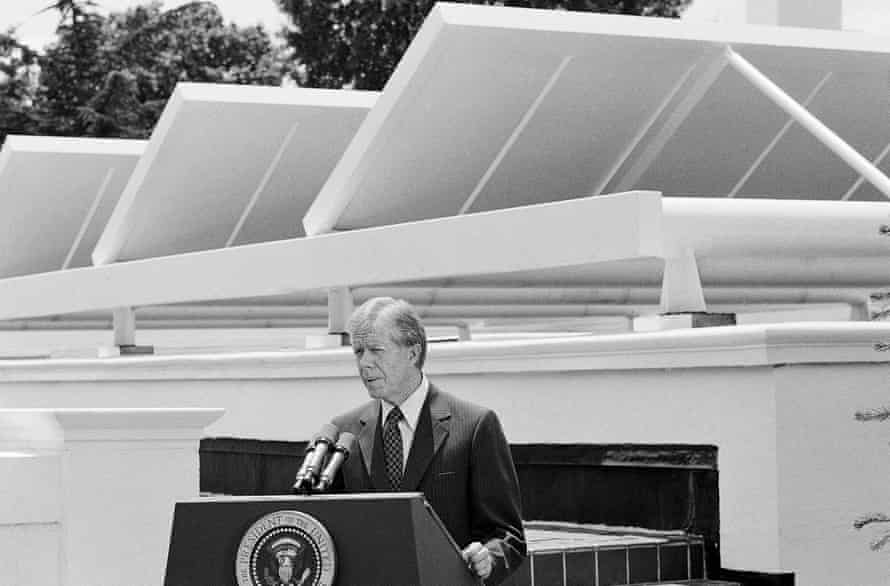 President Jimmy Carter speaks against a backdrop of solar panels at the White House Washington on 21 June 1979.