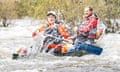 Mike MacEacheran and his guide Craig Reid get splashed in their canoe