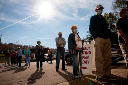 Early voters line up to cast their ballots for the 2020 election, in Vienna, West Virginia.