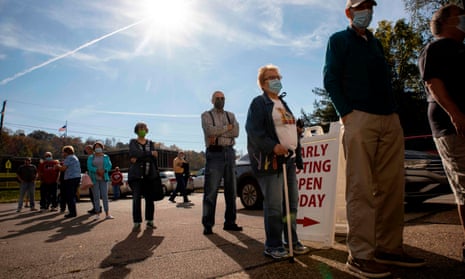Early voters line up outside of the Vienna Community Building to cast their ballots for the November 3 election, in Vienna, West Virginia, on 21 October 2020.