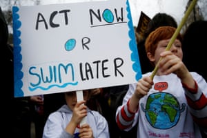Young people take part in the worldwide climate strike in London, UK