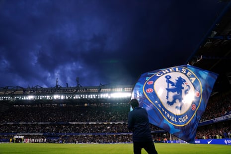 A Chelsea flag is waved ahead of the Premier League match at Stamford Bridge against Luton Town.