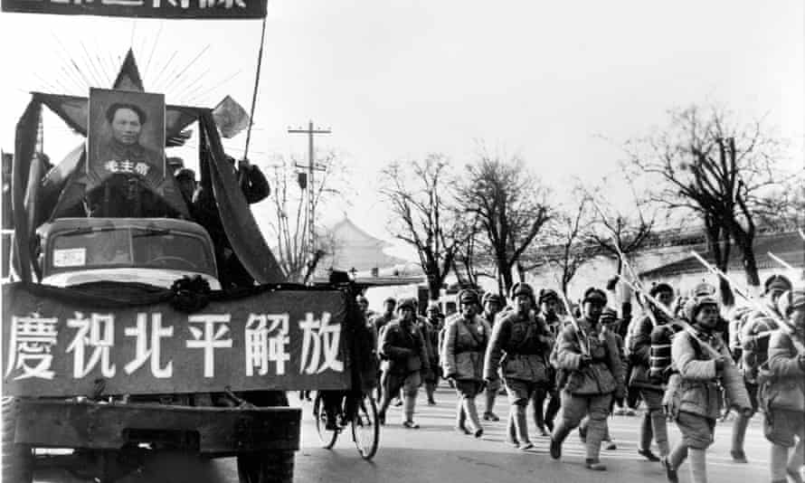 Chinese Communist troops enter Peking (now Beijing) in 1949.