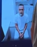 Screengrab from video shows Safiya sitting with hands cuffed