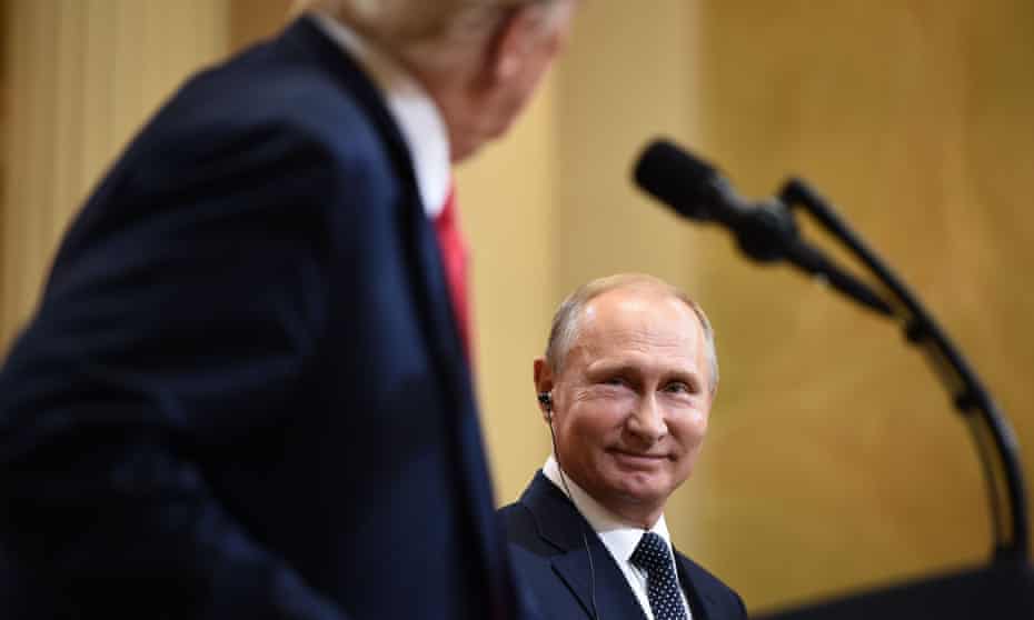 Donald Trump and Vladimir Putin attend a joint press conference in Helsinki.