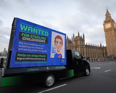 Van drivers over Westminster Bridge with sign featuring a cartoon image of Mark Zuckerberg and the words: ‘Wanted for stealing childhoods.’