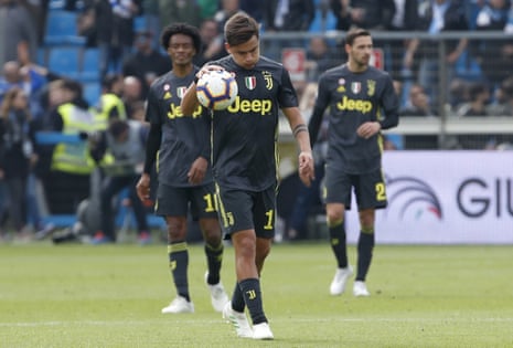Meanwhile’ Paulo Dybala and his Juventus teammates look downcast.