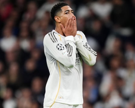 Jude Bellingham with his hands over his mouth during the Champions League match between Real Madrid and Manchester City