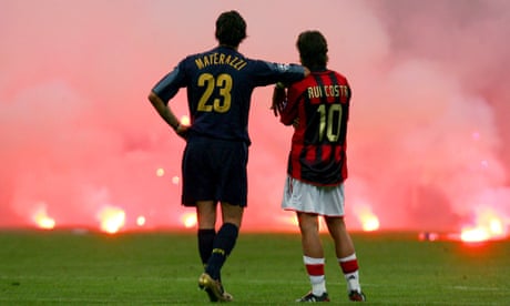 ‘Football is about friendship’: the photo that captured an iconic Milan derby moment