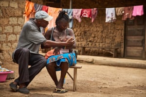 Yei Gborie breastfeeds her son Gborie in Kono district, Sierra Leone