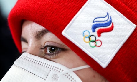 A Russian athlete arriving at Beijing airport on Friday ahead of the start of the Winter Olympics on 4 February