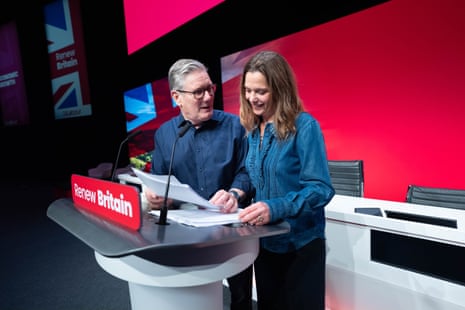 Keir Starmer with his wife, Victoria Starmer, at the conference podium where he will be delivering his keynote speech today. The picture was taken at the weekend for release today.