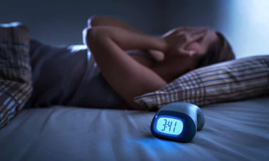 Sleepless woman suffering from insomnia, sleep apnea or stress. Tired and exhausted lady. Headache or migraine. Awake in the middle of the night. Frustrated person with problem. Alarm clock.<br>Sleepless woman suffering from insomnia, sleep apnea or stress. Tired and exhausted lady. Headache or migraine. Awake in the middle of the night. Frustrated person with problem. Alarm clock with time.