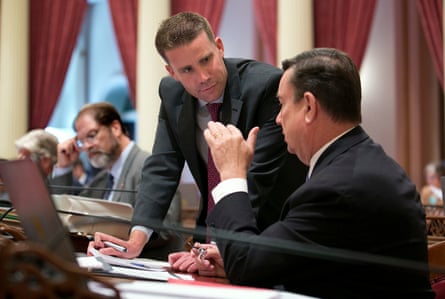 a man speaking to another man