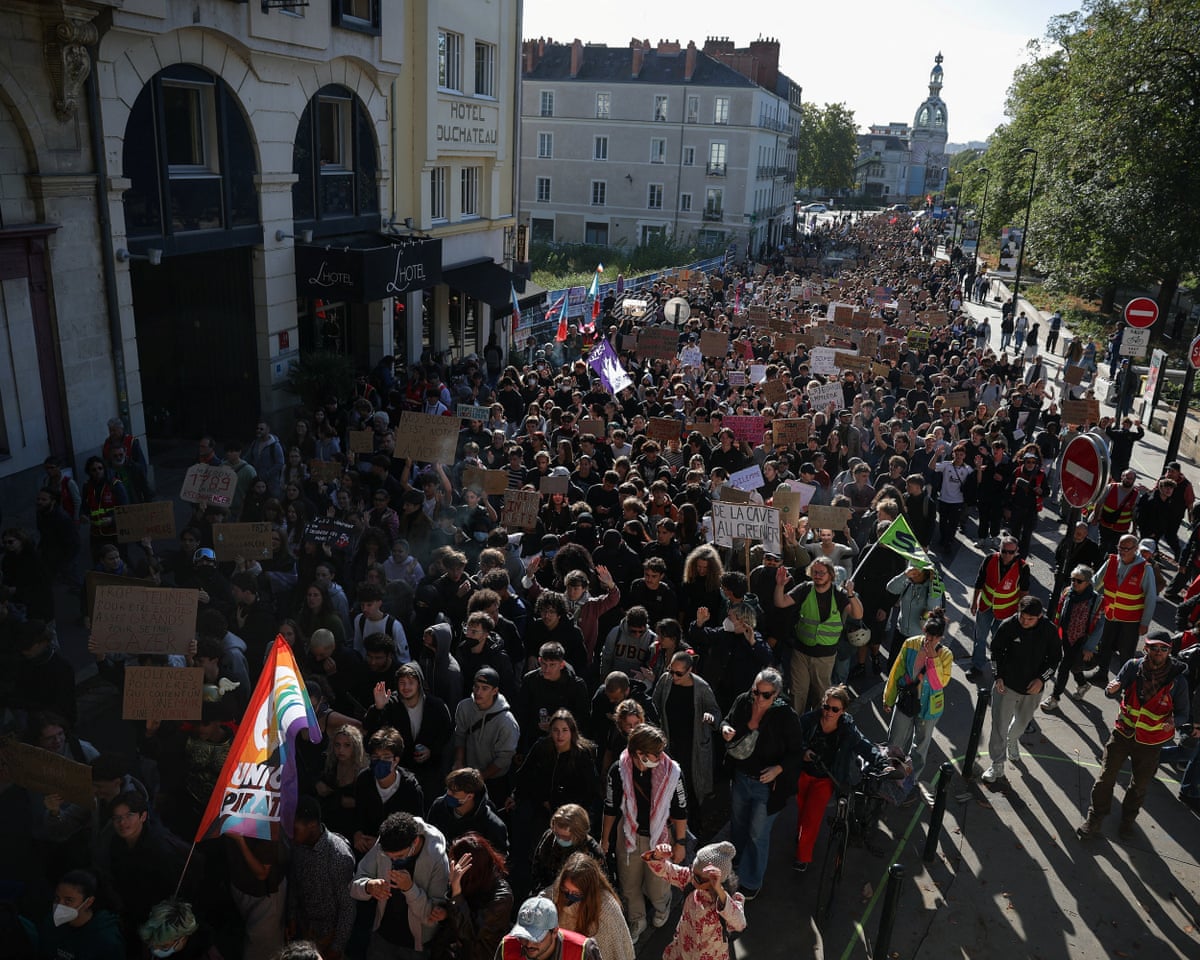 French high school and university students attend a demonstration in Nantes.