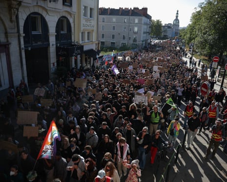 French high school and university students attend a demonstration in Nantes.