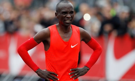 Eliud Kipchog,e after crossing the finish line during an attempt to break the two-hour marathon barrier at the Monza circuit in Italy on 6 May.