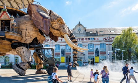 The giant elephant puppet roaming an island in the Loire, in Nantes.