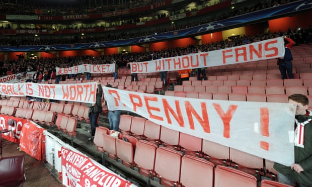 Bavarian fans protest before the match between Arsenal and Bayern Munich at the Emirates Stadium in London