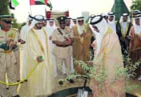 Sheikh Mohammed al-Maktoum planting the first tree of his ambitious environmental initiative