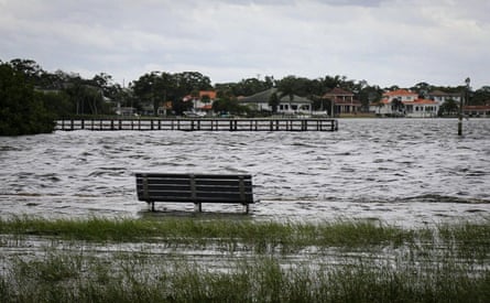Flooded streets are seen along Coffee Pot Bayou as Hurricane Helene charges toward the Big Bend region of Florida.