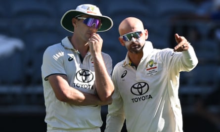 Pat Cummins and Nathan Lyon in deep discussion