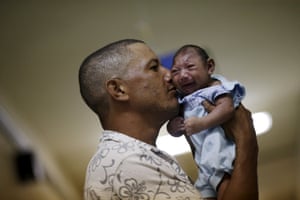 Geovane Silva with his son Gustavo Henrique, who has microcephaly, at the Oswaldo Cruz hospital, Recife, Brazil
