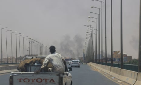 Smoke rises near Halfaya Bridge between Omdurman and Khartoum.