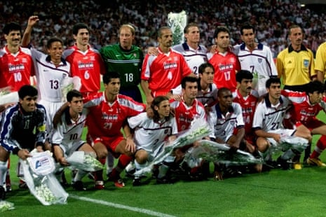 US and Iranian players pose for a group photo before the start of their World Cup first round match in Lyon in 1998.