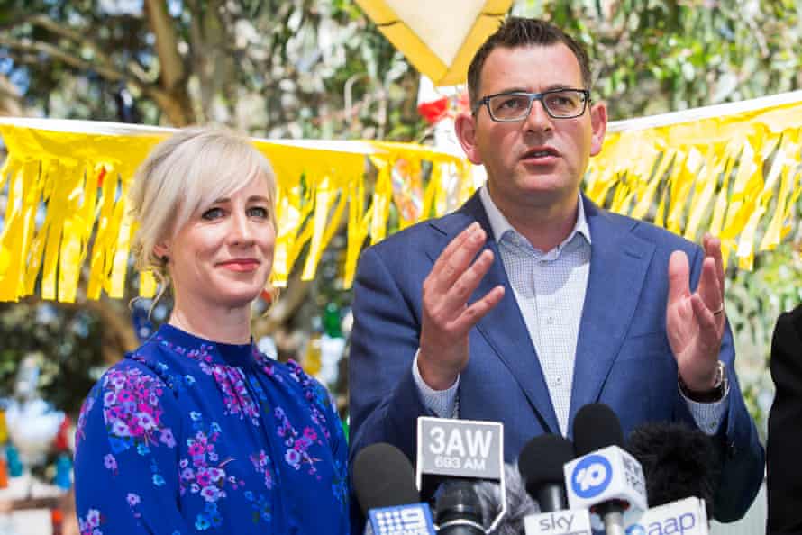 Daniel Andrews holds a media conference with his wife, Catherine.