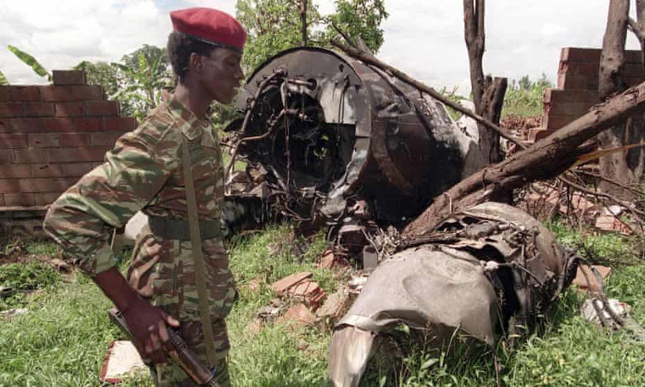 A Rwanda Patriotic Front rebel walks by the site of the 6 April 1994 plane crash in Kigali that killed the then president, Juvénal Habyarimana.
