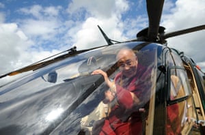 Dalai Lama prepares to leave in a helicopter in Aubry, France in 2008.
