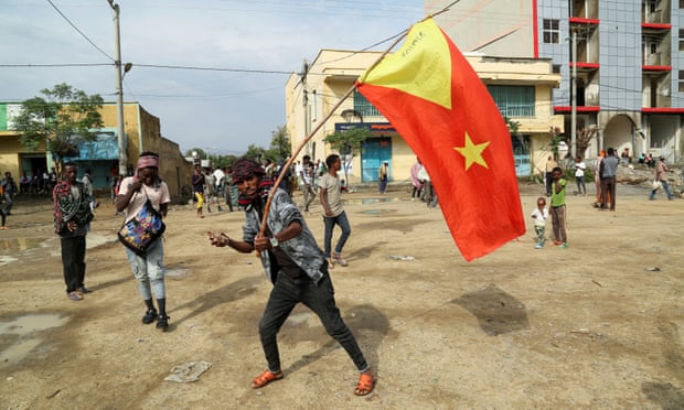 A man waves a Tigray flag in the village of Nebelet in the north of the rebel region.