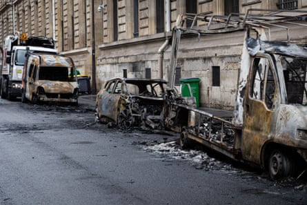 Burnt-out cars and vans in Place de la République