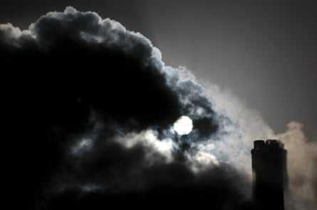 The sun seen through the steam and other emissions coming from funnels of the brown coal Loy Yang Power Station in the Latrobe Valley near Melbourne. 