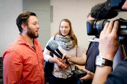 Yonathan and Lotte speak to journalists prior to a court decision last month.