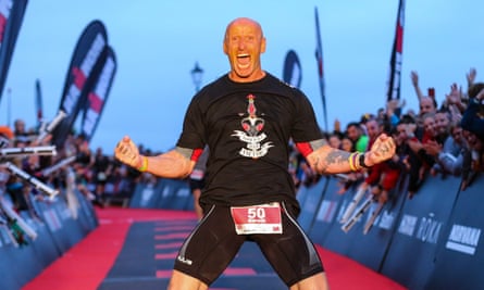 Celebrating after completing his first Ironman.