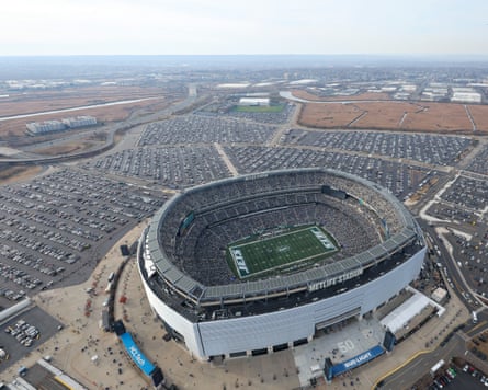 An aerial view of MetLife Stadium surrounded by parking lots.