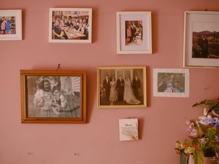 Family photos hanging in Ellen Rogers' mother's house