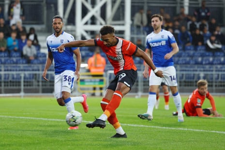 Fulham v Tottenham, Newport v Brentford, and more: Carabao Cup second round – live | Carabao Cup 7 Jacob Brown of Luton Town scores the team's first goal.