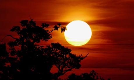 The sun rises on Dunsden, Oxfordshire, UK, 18 July 2022.