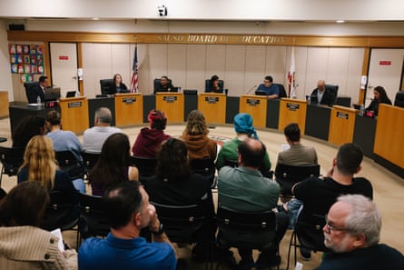 People attend a board meeting