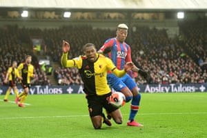 Christian Kabasele goes down under the challenge of Patrick van Aanholt.