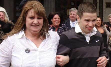 Hallam leaves the court of appeal in London with his mother Wendy after he was freed.