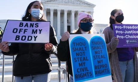 Lauren Morrissey, with Catholics for Choice (center), joined a abortion-rights rally outside the supreme court, 1 November 2021, in Washington.