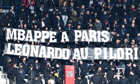PSG supporters hold a banner reading "Mbappe in Paris, pillory Leonardo"