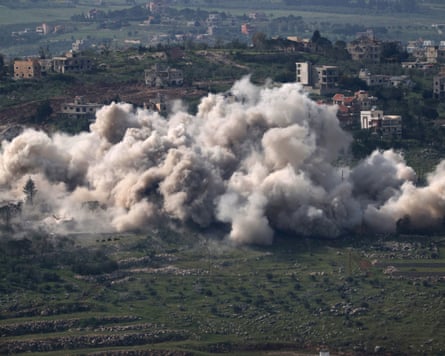 Smoke rises from hillside as Israeli army conducts demolition operations in the southern Lebanese village of Taybeh.