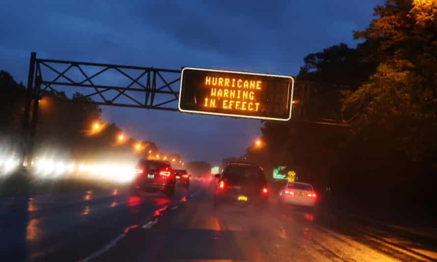 Signs on the highway warn commuters not to travel on Sunday.