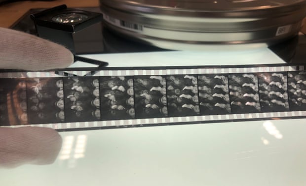 Hand holds Europa’s original 35mm nitrate